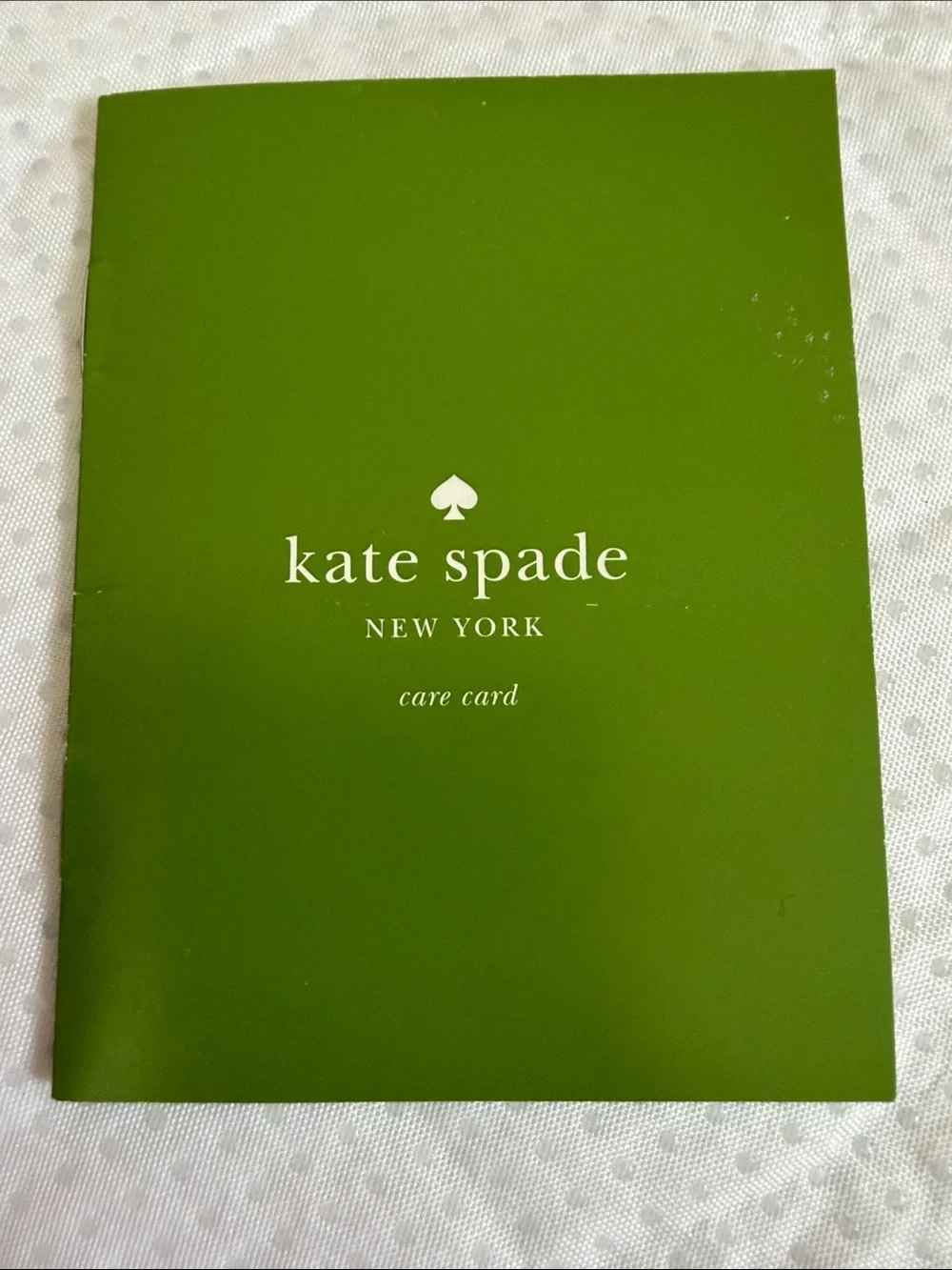 kate spade pink leather wristlet with green palm applique